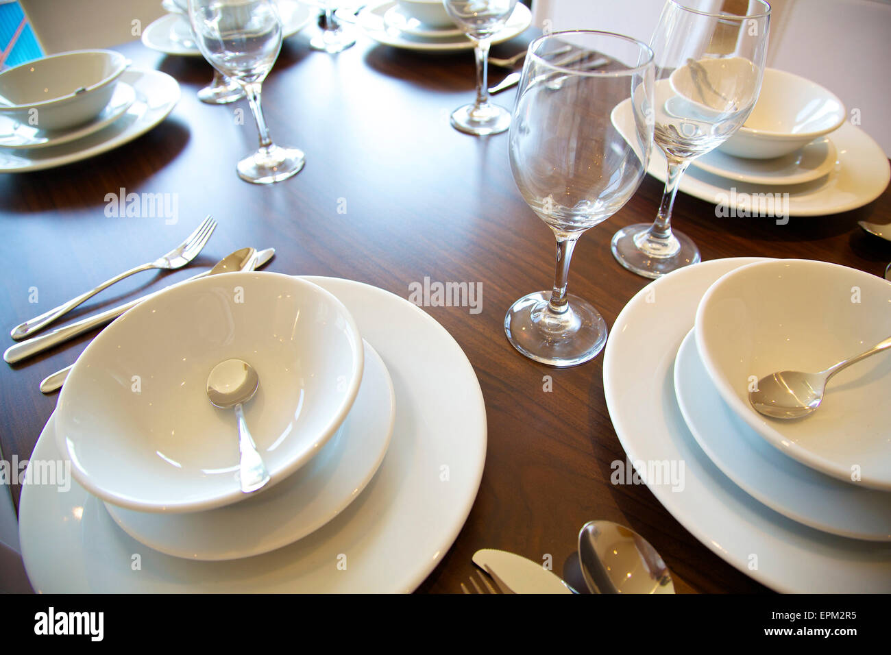 Place setting on dining table in  at 419 Wick Lane, London. New apartments built by Development securities Plc opposite the Olympic Stadium in London, UK. Stock Photo