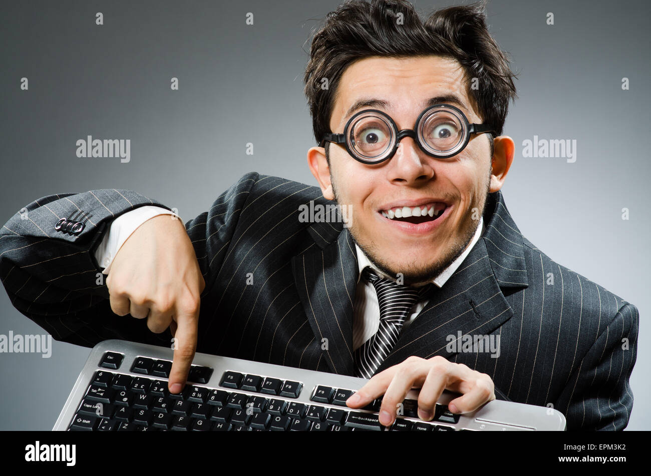 Computer geek with computer keyboard Stock Photo