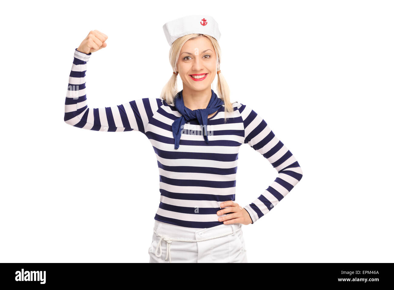 Blond female sailor showing her bicep and looking at the camera ...