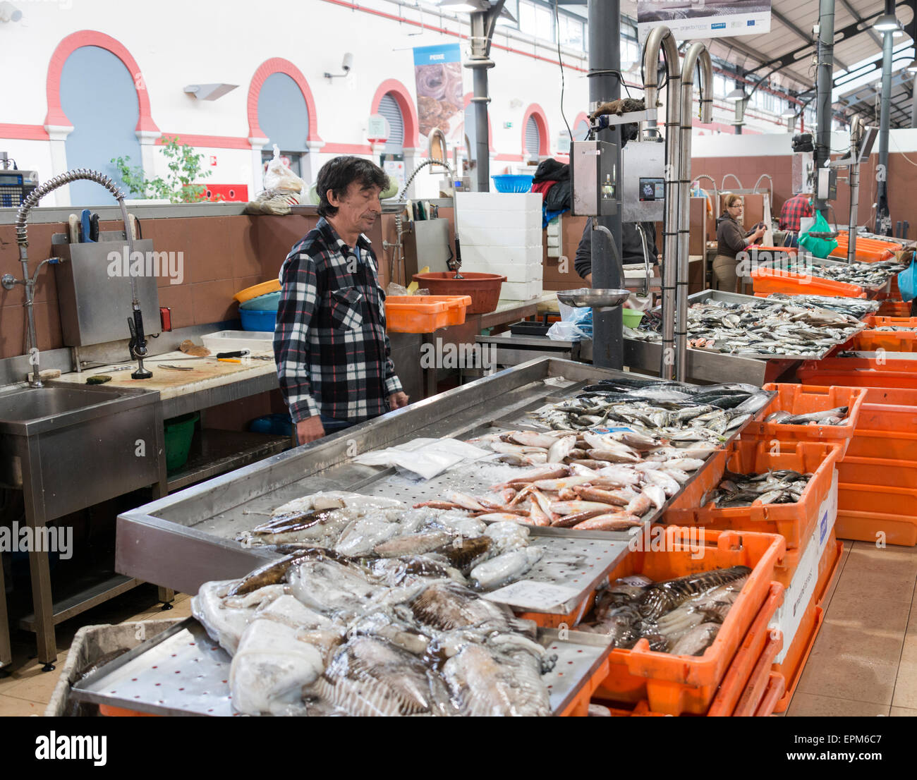 LOULE, PORTUGAL APRIL 4 Man selling fish in the traditional