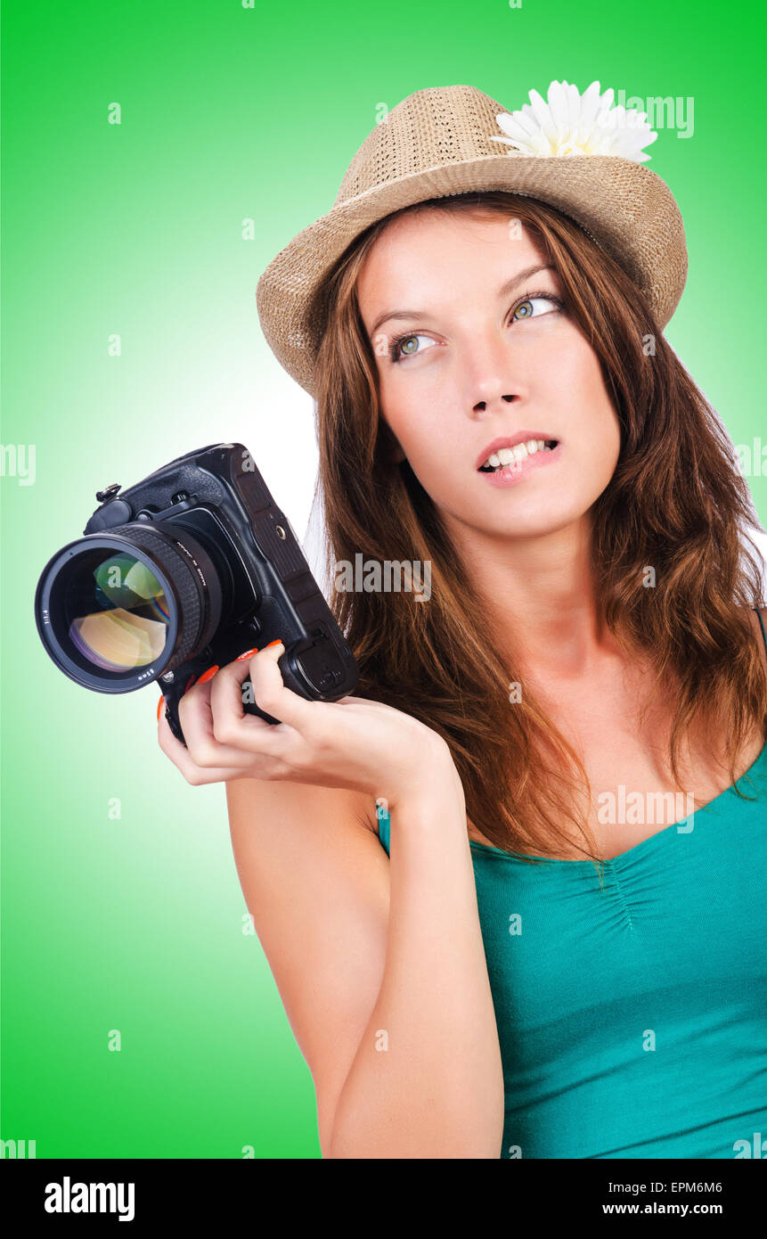 Attractive female photographer on white Stock Photo Alamy