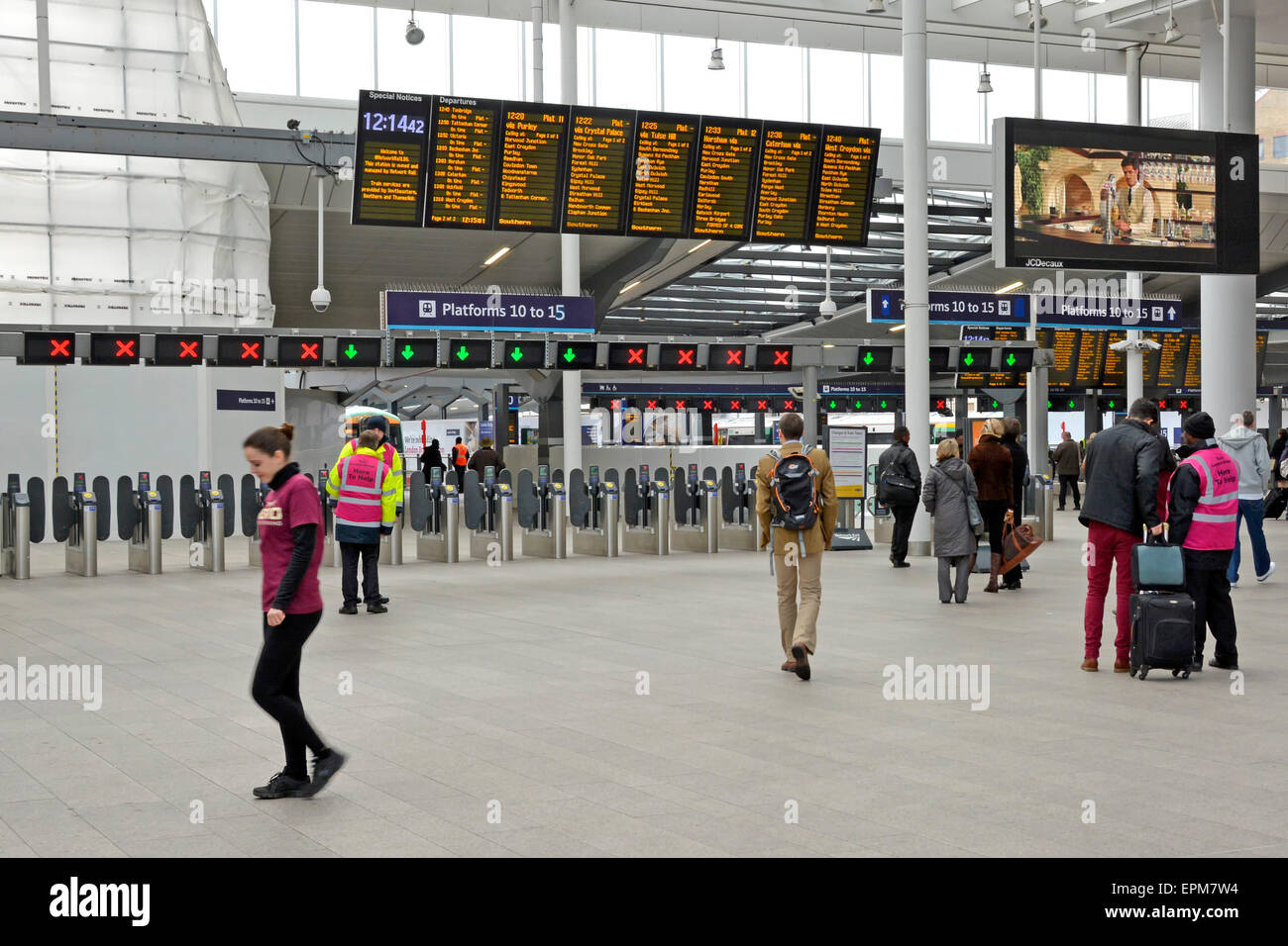 London Bridge station departure board and train ticket barrier seen after completion of part of the major upgrade project London England UK Stock Photo