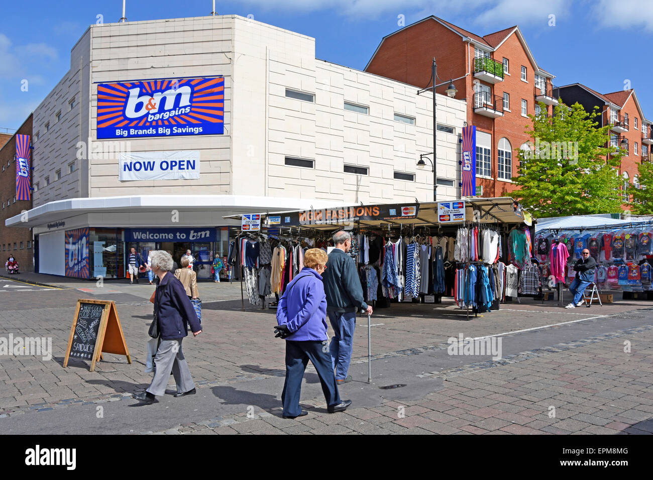 Romford market place stalls with a recently opened B&M Billington & Mayman bargain store market place London Borough of Havering England UK Stock Photo