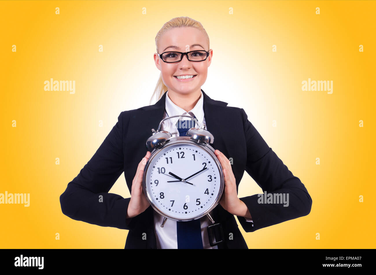 Woman with giant clock on white Stock Photo - Alamy