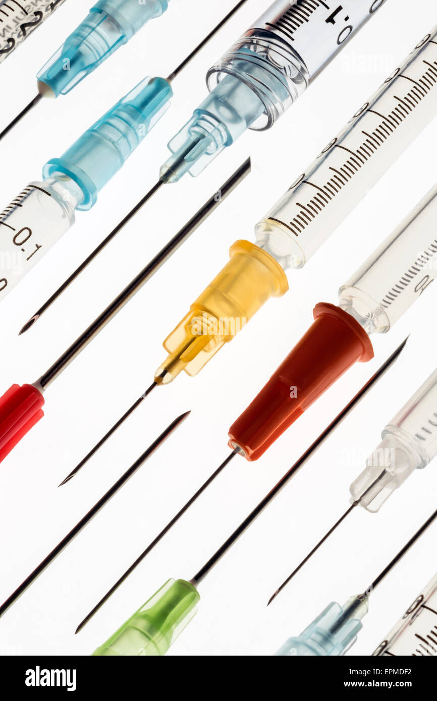 Medical syringes and needles used for giving injections of drugs in