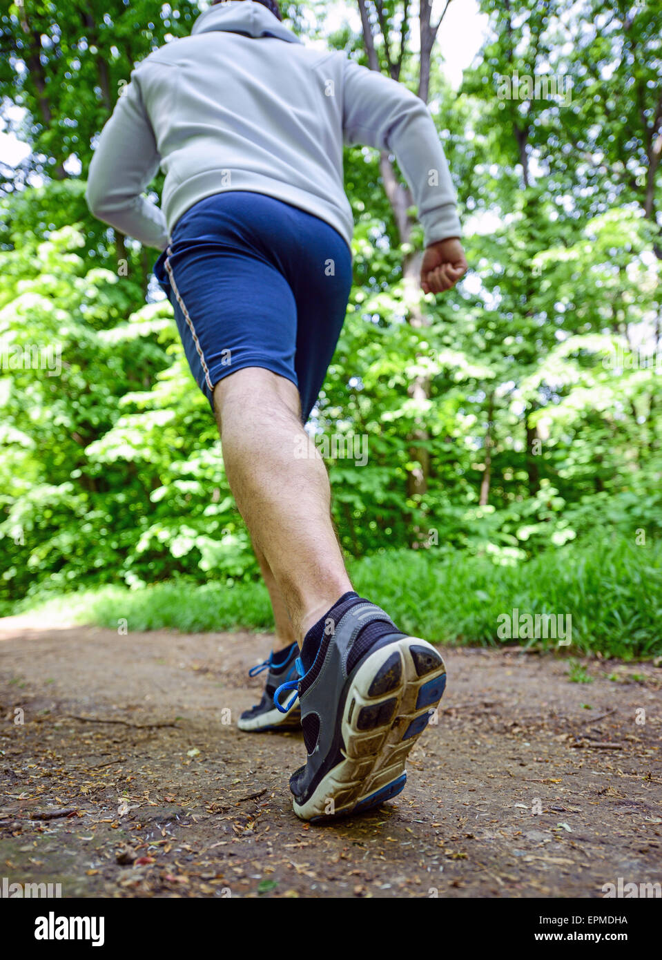 Runner feet running on road closeup on shoe Stock Photo Alamy