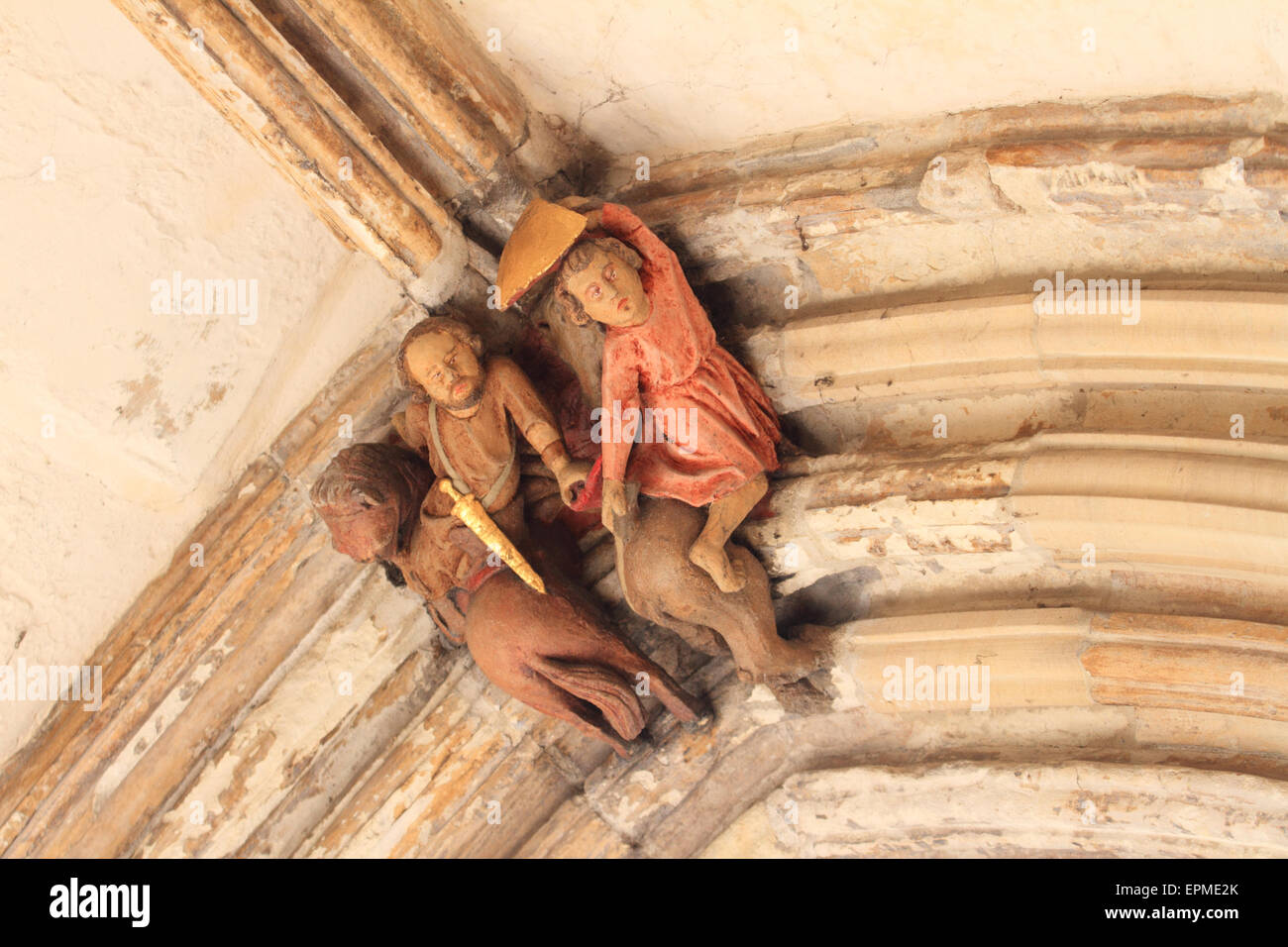 misericord,decorative face on high ceiling, high church,Norwich Cathedral,Norfolk, UK Stock Photo