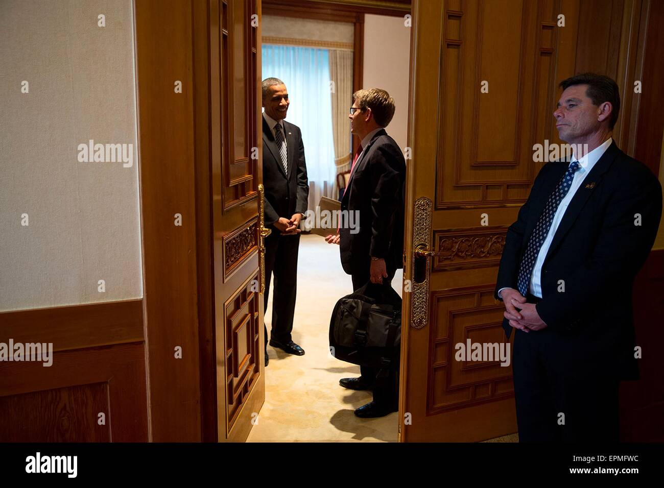 U.S. President Barack Obama talks to Press Secretary Jay Carney prior ...