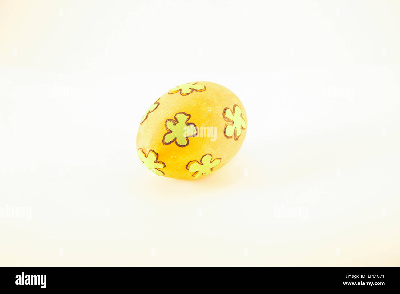 One orange easter egg, isolated on white background Stock Photo
