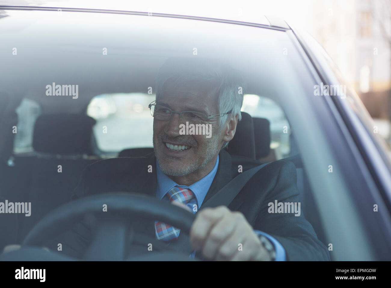 Man tie smiling car steering wheel hi-res stock photography and images ...