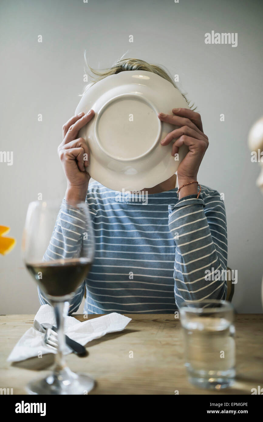 Licking plate hires stock photography and images Alamy