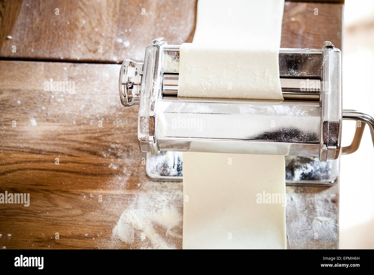 Homemade pasta in pasta machine Stock Photo - Alamy