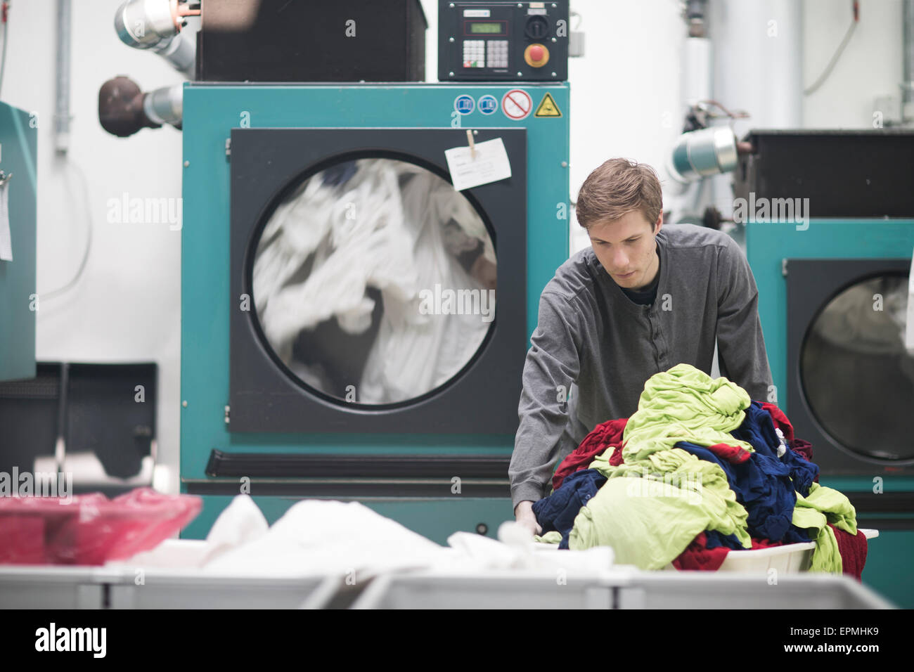 Worker in laundry Stock Photo Alamy