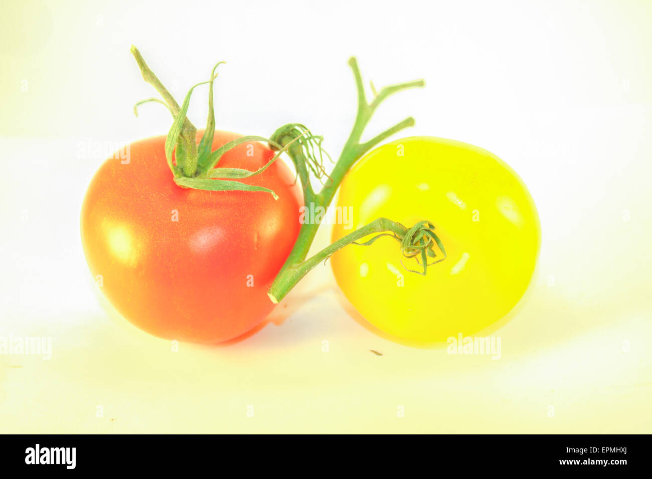 Red and yellow tomato, isolated on white background Stock Photo - Alamy