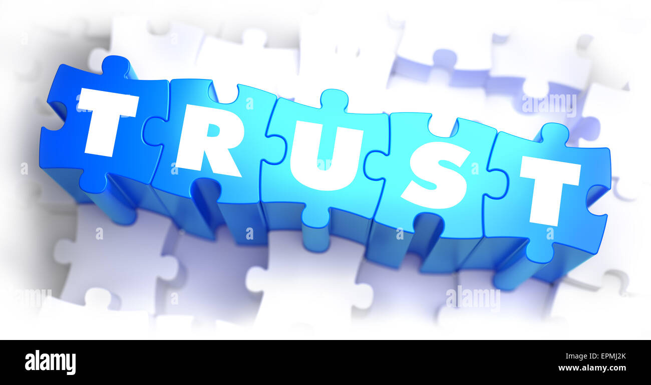 Trust - White Word on Blue Puzzles on White Background. 3D Illustration. Stock Photo