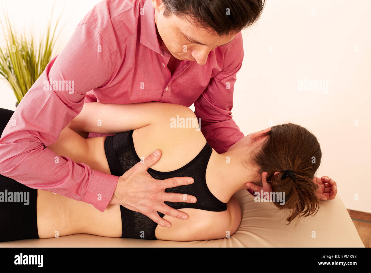Orthopedic surgeon with a patient in treatment. Stock Photo