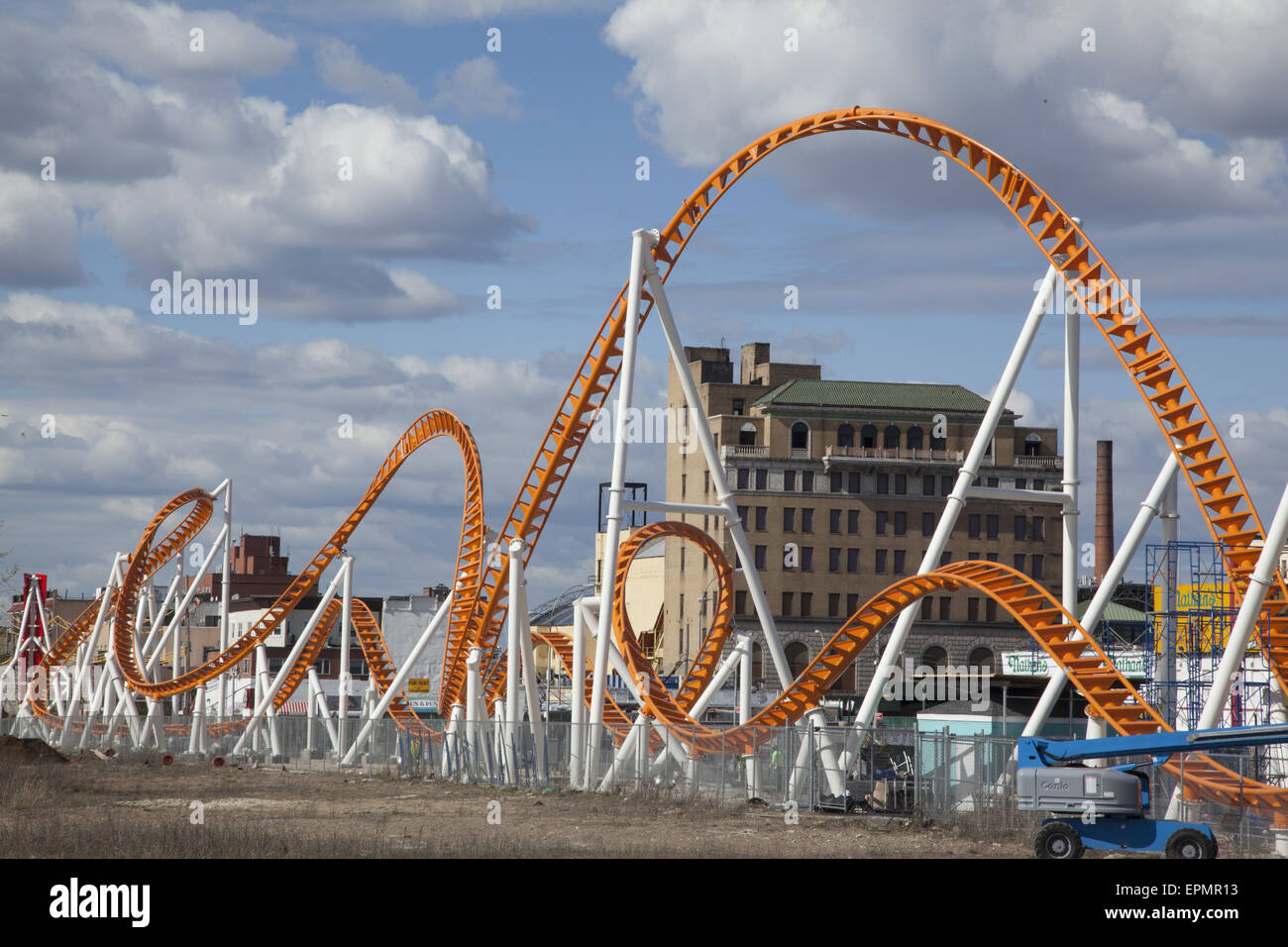 The Thunderbolt roller coaster against the blue sky with puffy clouds at Coney Island, Brooklyn, NY. Stock Photo