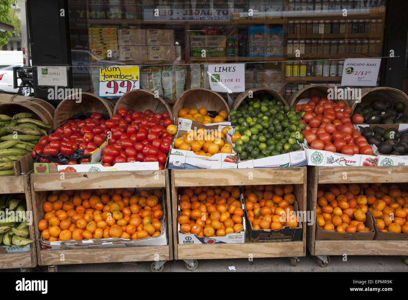 Fresh produce on display on the sidewalk at a market on Church Ave. in Brooklyn, NY. Stock Photo