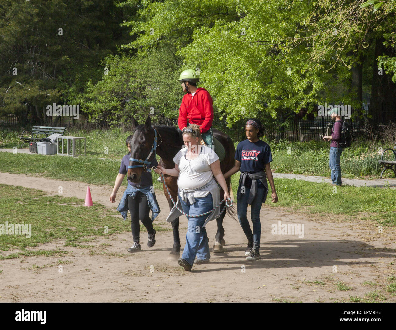 Disabled children receive developmental therapy learning to ride horses, known as Hippotherapy. Prospect Park, Brooklyn, NY Stock Photo