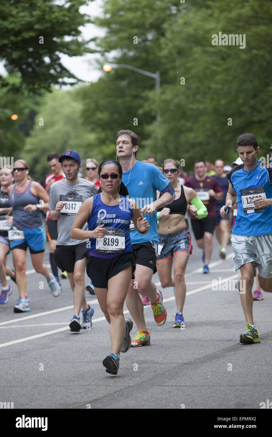 Over 25,000 runners participated in the 2015 Brooklyn ½ Marathon. Runners come to the halfway point in Prospect Park. Stock Photo