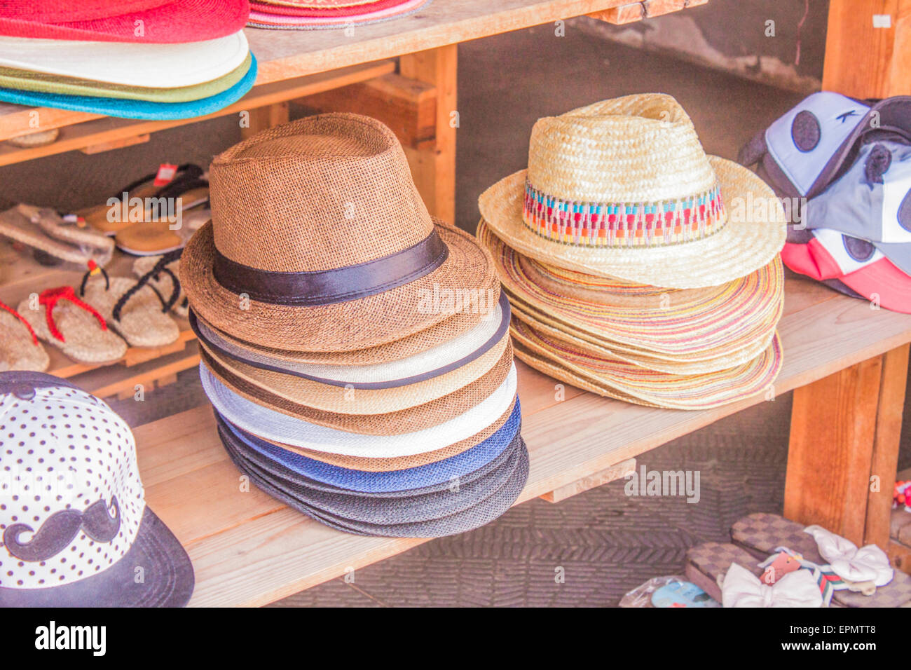 A shop full of hat, at a market Stock Photo
