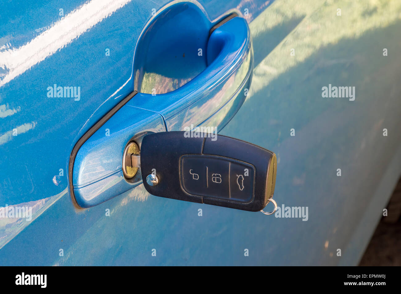 Car key in the door lock Stock Photo Alamy