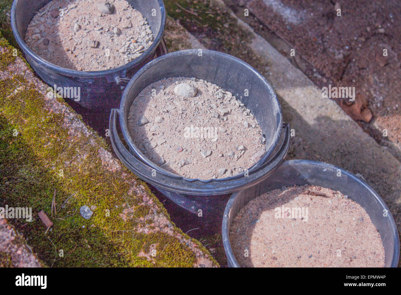 Three sand buckets, at my home yard Stock Photo