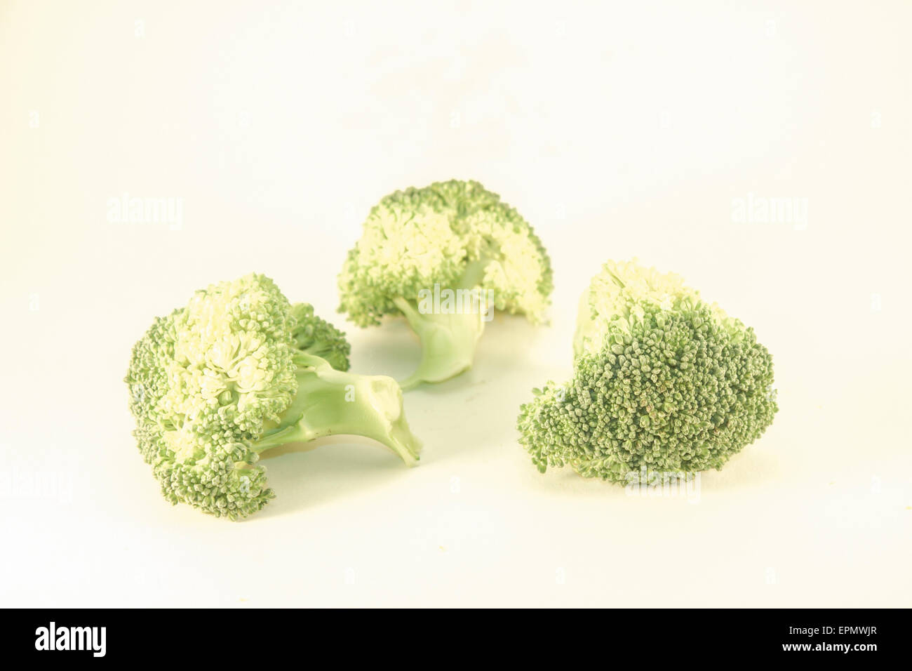 Three pieces of green broccoli, isolated on white background Stock ...