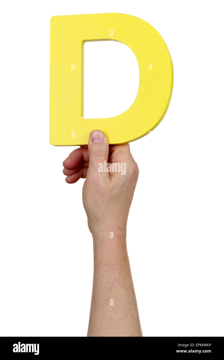 Hand holding letter D from alphabet isolated on a white background ...