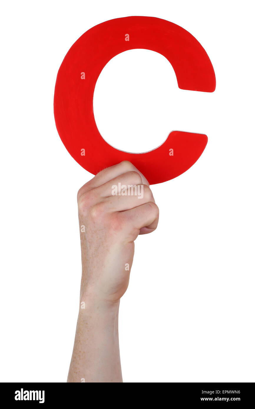 Hand holding letter C from alphabet isolated on a white background Stock Photo