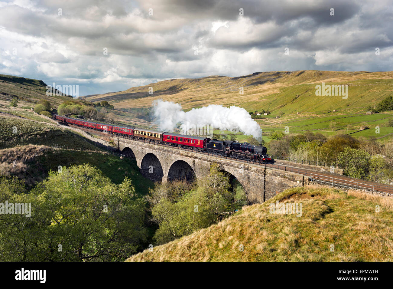 Yorkshire Dales, UK. 19th May, 2015. On a sunny afternoon, steam locomotive 'Leander' takes The Daleman rail excursion over Ais Gill viaduct, near Kirkby Stephen, Cumbria, UK. Credit:  John Bentley/Alamy Live News Stock Photo