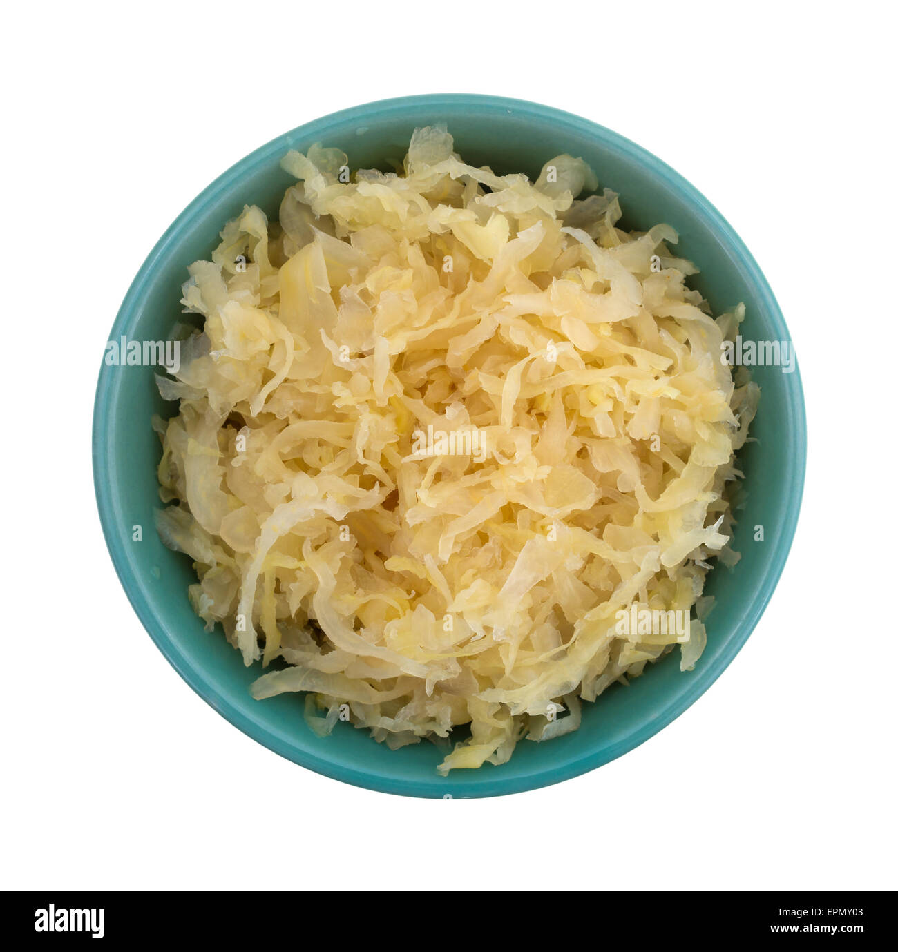 Top view of a small bowl filled with canned sauerkraut isolated on a white background. Stock Photo