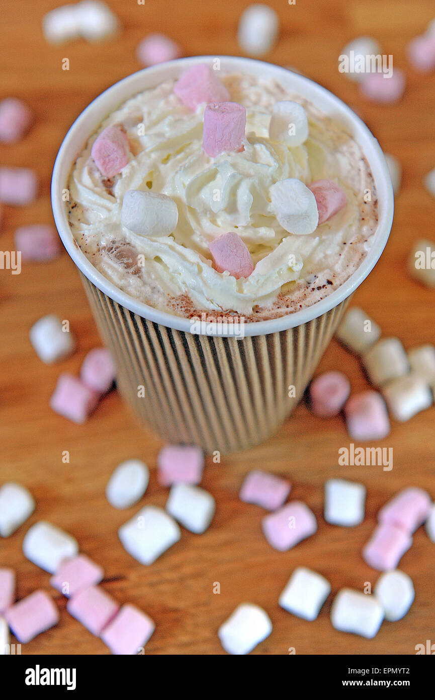 Studio shot of brown triple lined paper coffee cup filled with hot ...