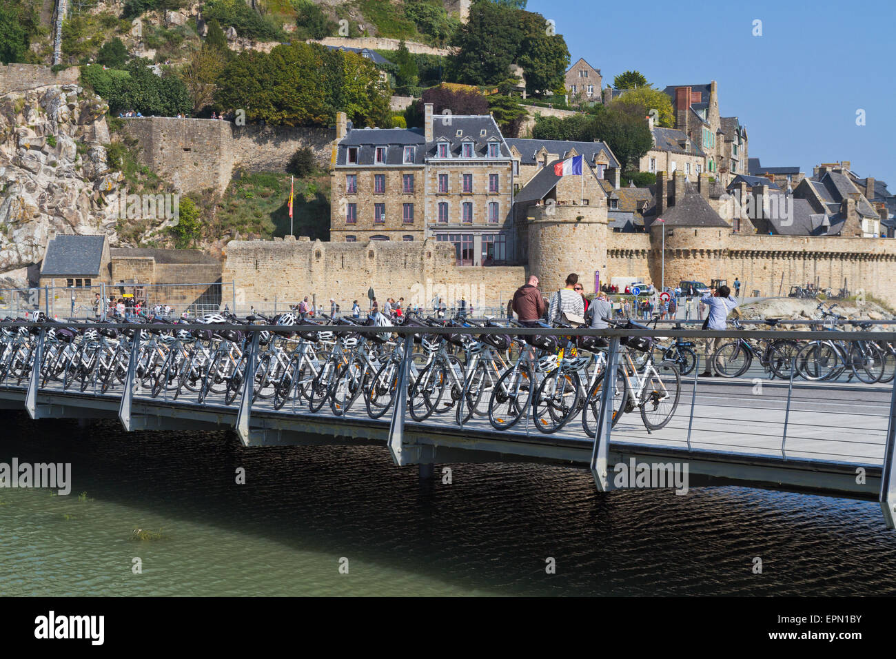 Mont St Michel in Normandy with new bridge and bicycles parked on it Stock Photo