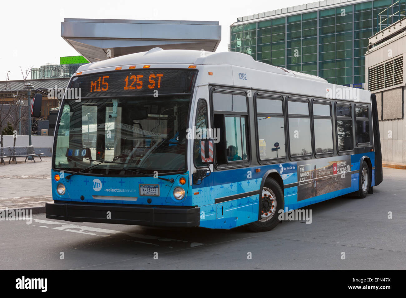 An M15 NovaBus LFS Articulated bus waits to depart for 125th Street from South Ferry in New York City. Stock Photo