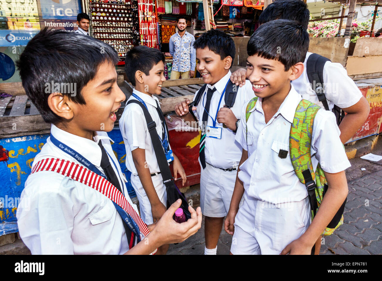 Mumbai India,Apollo Bandar,Colaba,Indumati Sakharkar Marg,Road,Colaba Causeway,male boy boys kids children friends,student students uniforms,The Schol Stock Photo
