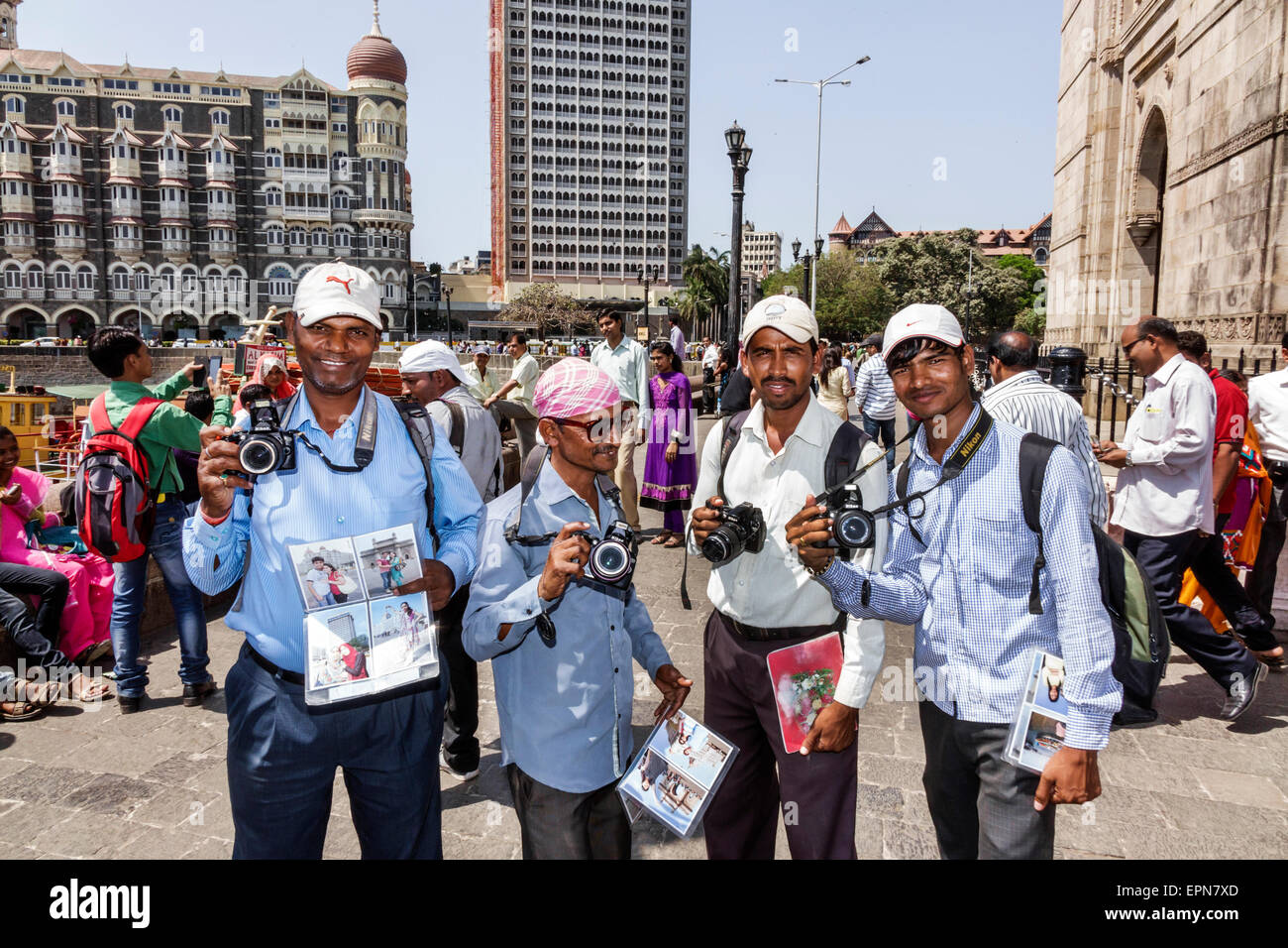 Mumbai India,Apollo Bandar,Colaba,Gateway of India,Indo-Saracenic style stone arch,The Taj Mahal Palace,hotel,man men male,photographers,photographer, Stock Photo