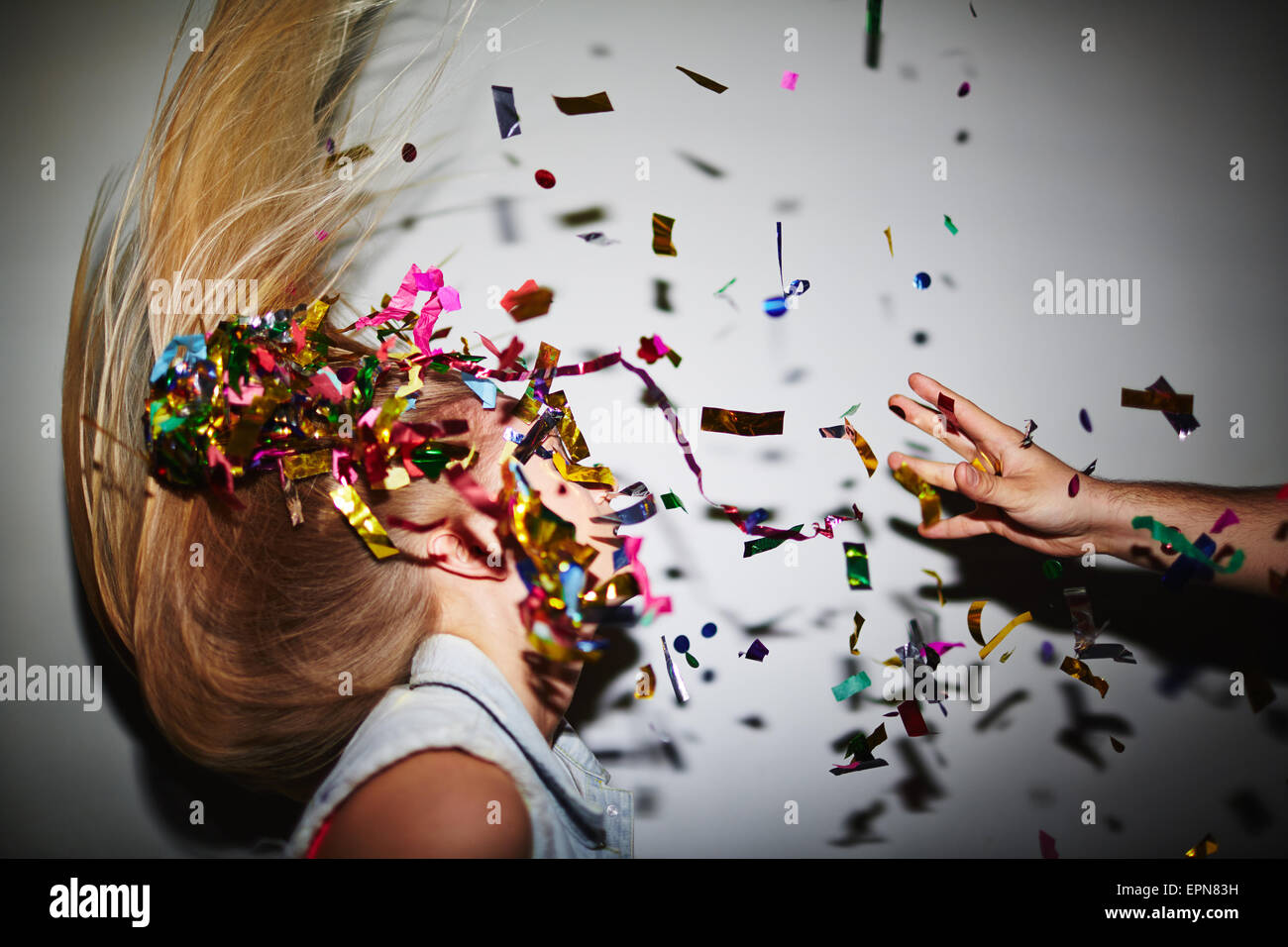 Hand throwing confetti hires stock photography and images Alamy