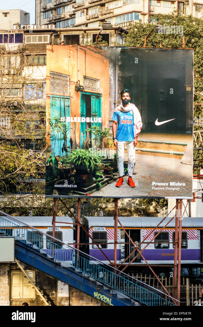Mumbai India,Indian Asian,Girgaon,Maharshi Karve Road,Charni Railway Station,Western Line,billboard,advertisement,ad advertising advertisement,Nike,vi Stock Photo