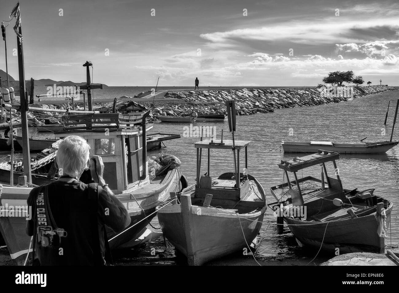 Photographer taking photograph. Black and white photography Stock Photo