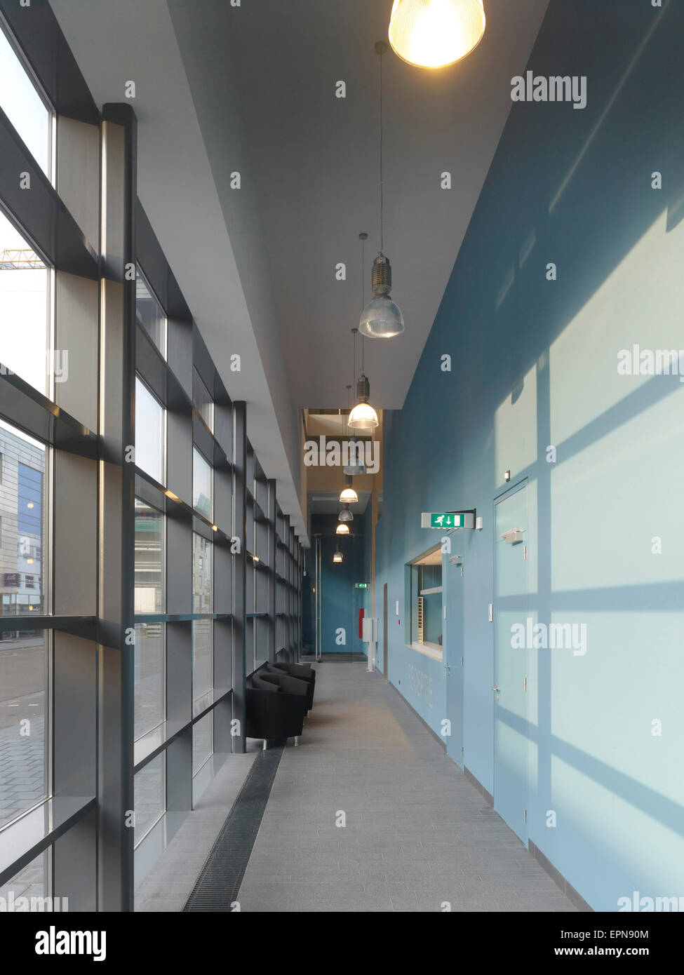 Ground floor corridor with window wall. Fire Station Dordrecht