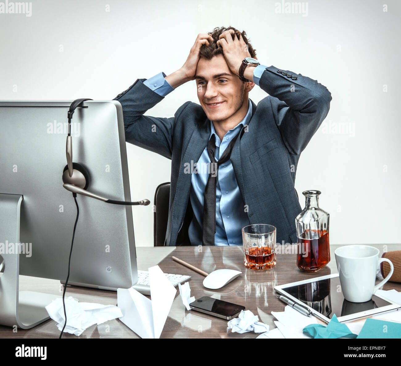 Overworked man sitting workplace hi-res stock photography and images ...