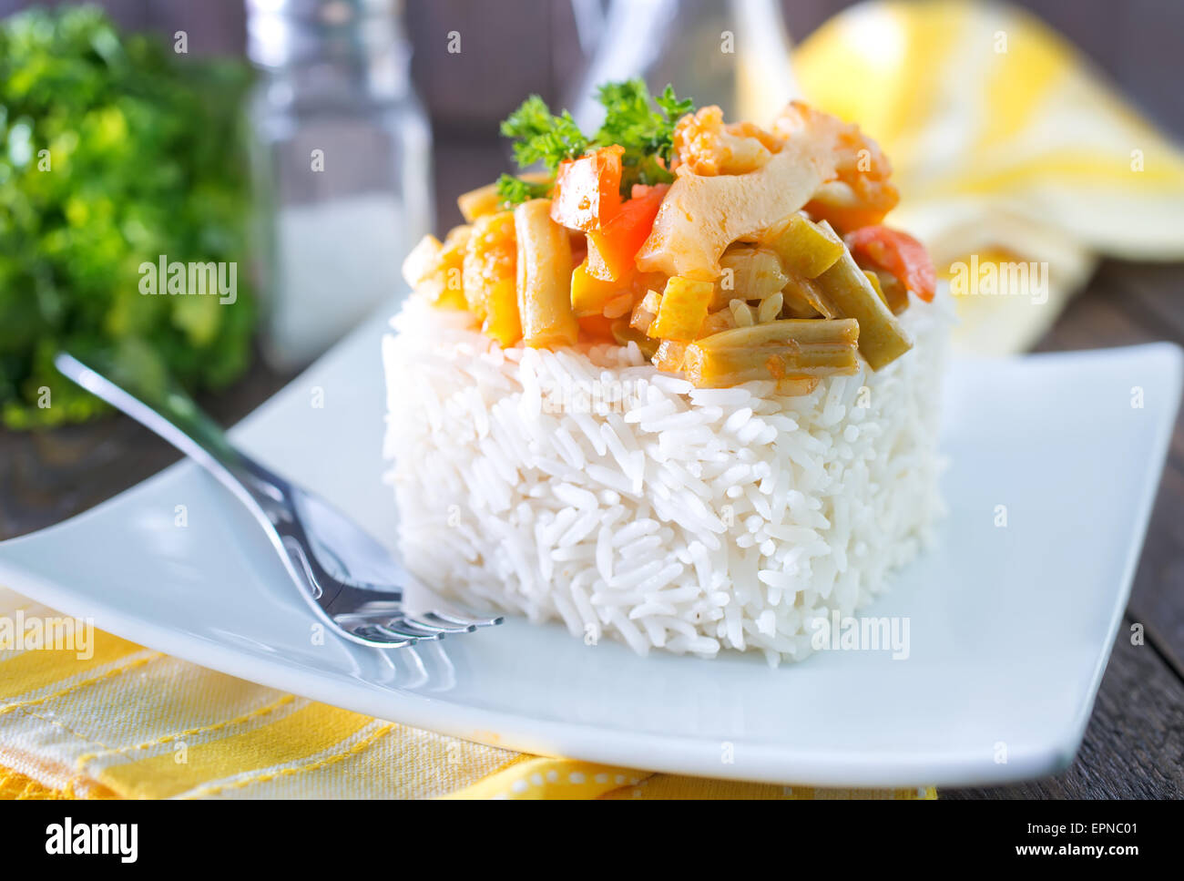 boiled rice and vegetables on the white plate Stock Photo - Alamy