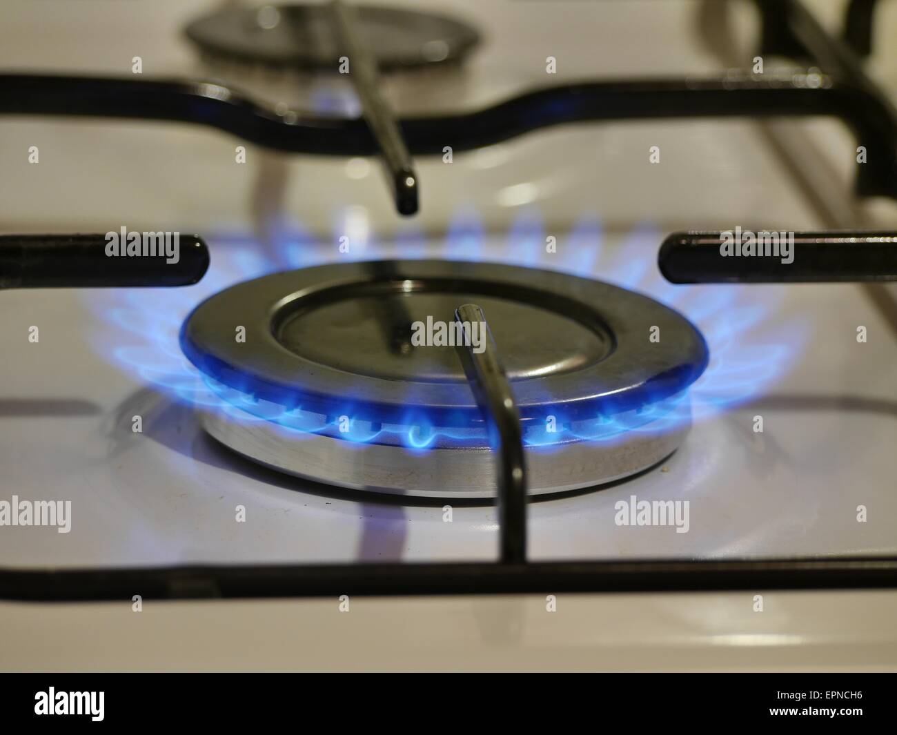 gas cooker with blue fire Stock Photo