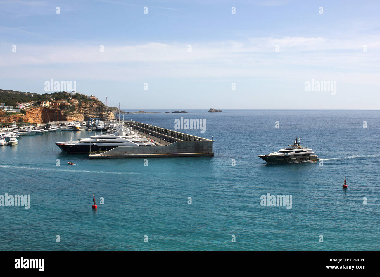 Luxury Mallorca - Superyacht / Motor Yacht 'Trident' ( 65 mtr Feadship) entering marina - Luxury Superyachts in Port Adriano Stock Photo