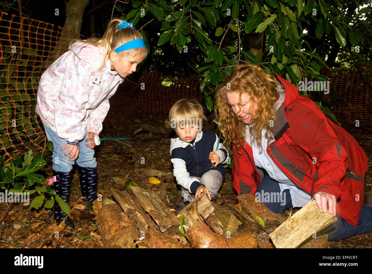 Celebrity TV gardener Charlie Dimmock (TVs Ground Force) searching for 'bugs' during Grow For It nature awareness day for chil Stock - Alamy