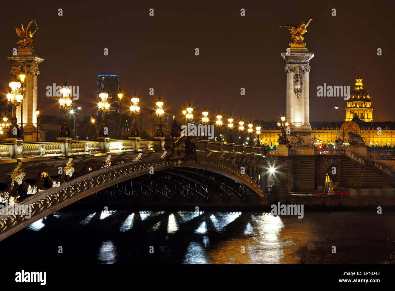 The Alexander III Bridge at night in Paris, France Stock Photo