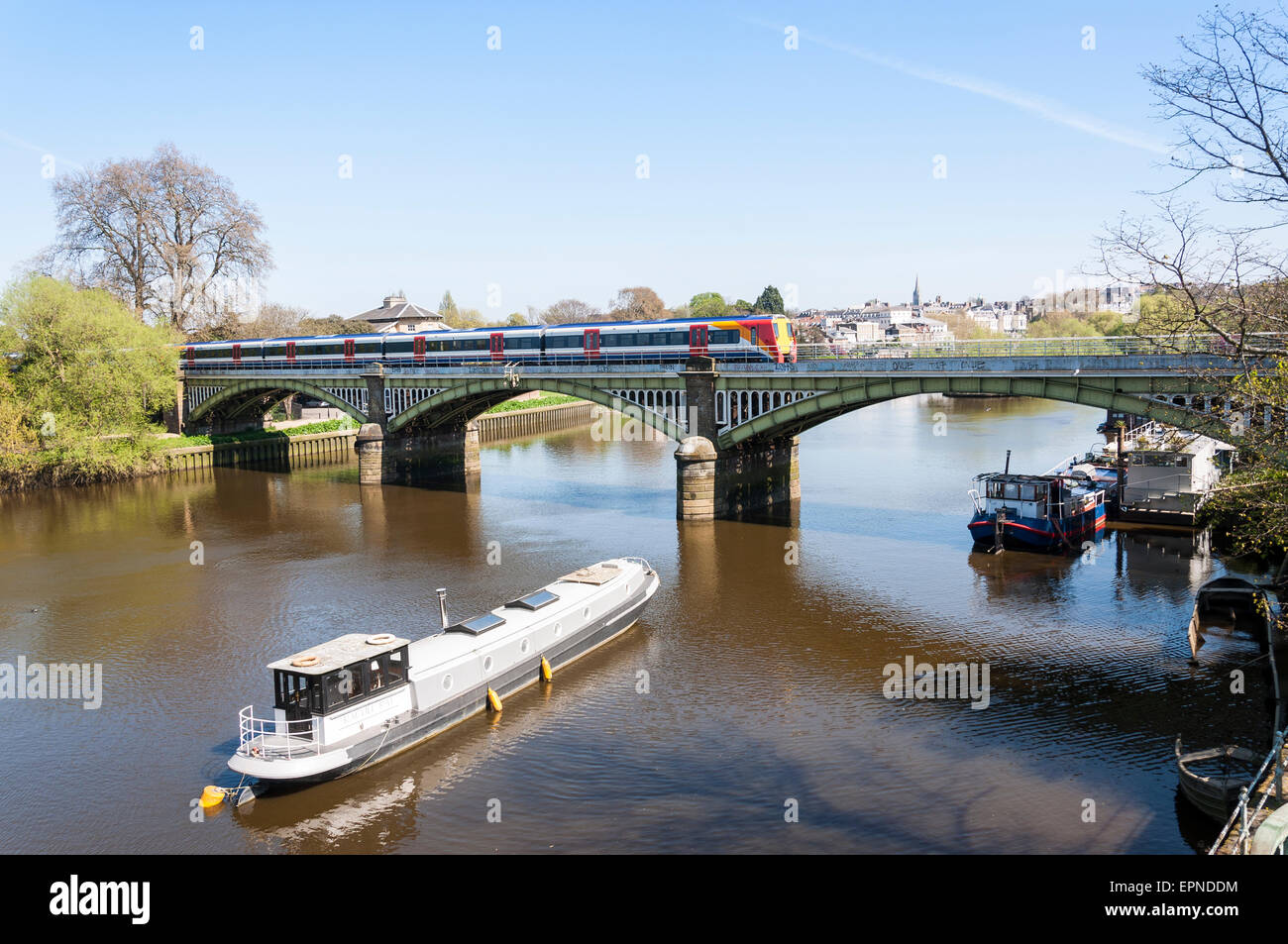 South West train crossing Richmond Railway Bridge,Twickenham, London Borough of Richmond, Greater London, England,United Kingdom Stock Photo