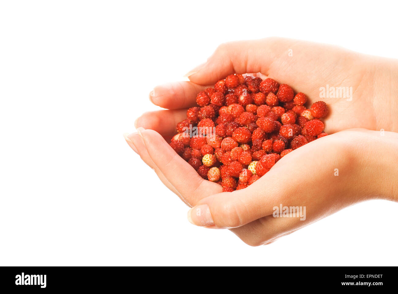 Handful of strawberries isolated on white background Stock Photo - Alamy