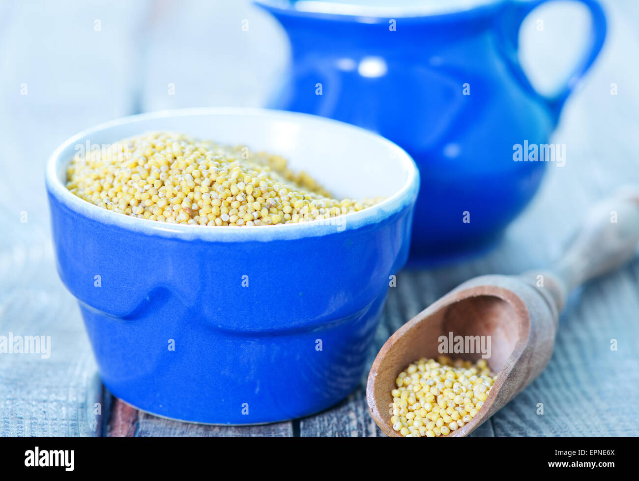 millet porridge in bowl and on a table Stock Photo Alamy